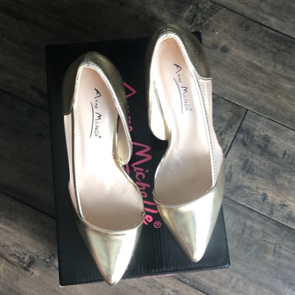 Gold pointed to pump - Picture 5 of 5